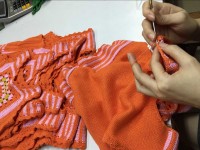 high end sweater production - hand crochet | Fine Knitting
